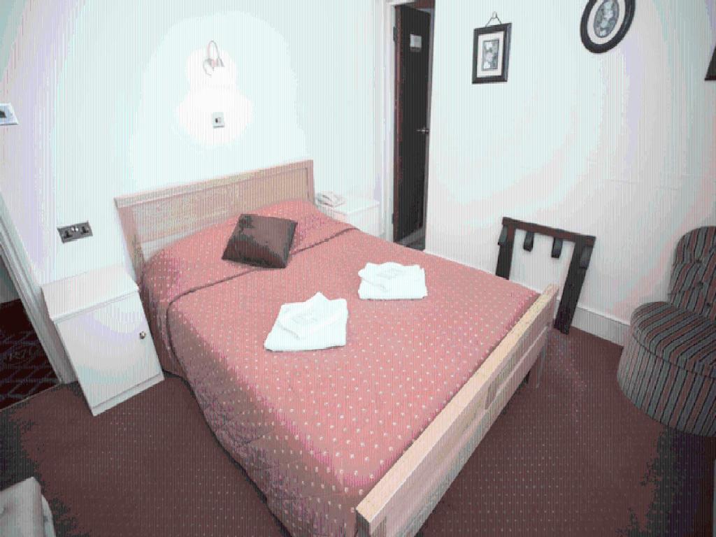 צ'ינגפורד Oyo Ridgeway Hotel חדר תמונה